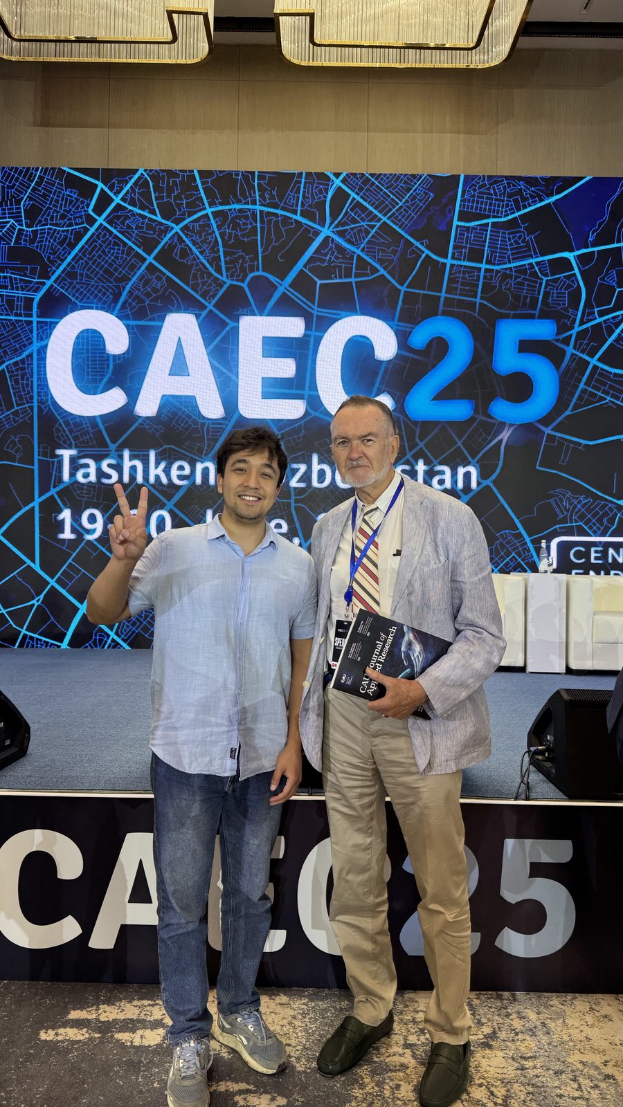 Asadbek Sultonov with Prof. Peter Alken at the CAEC25 Central Asian Endourology Congress in Tashkent