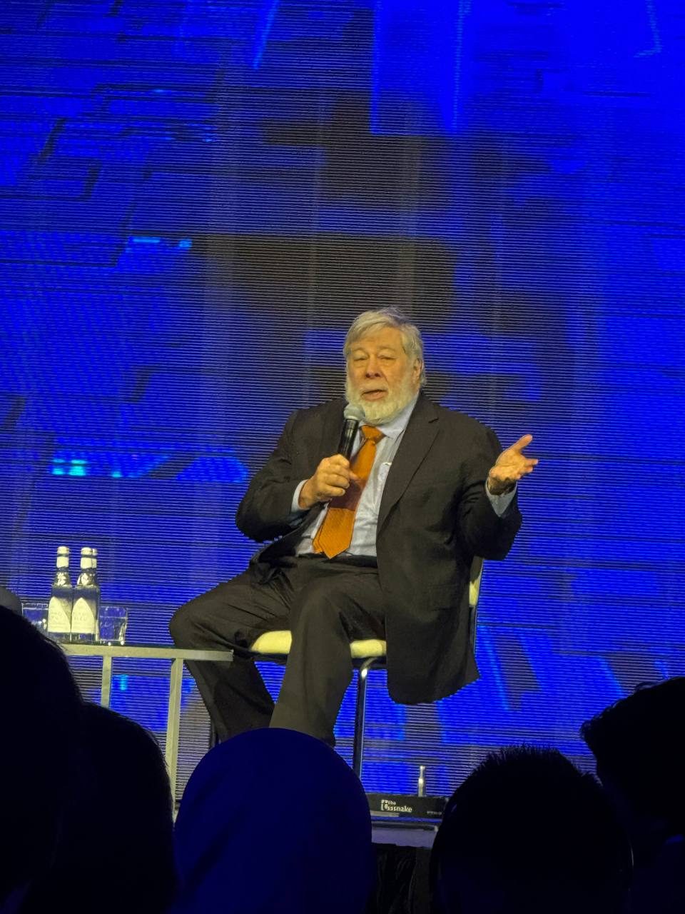 Steve Wozniak speaking on stage at the CAU Tech Summit 2025 in Tashkent